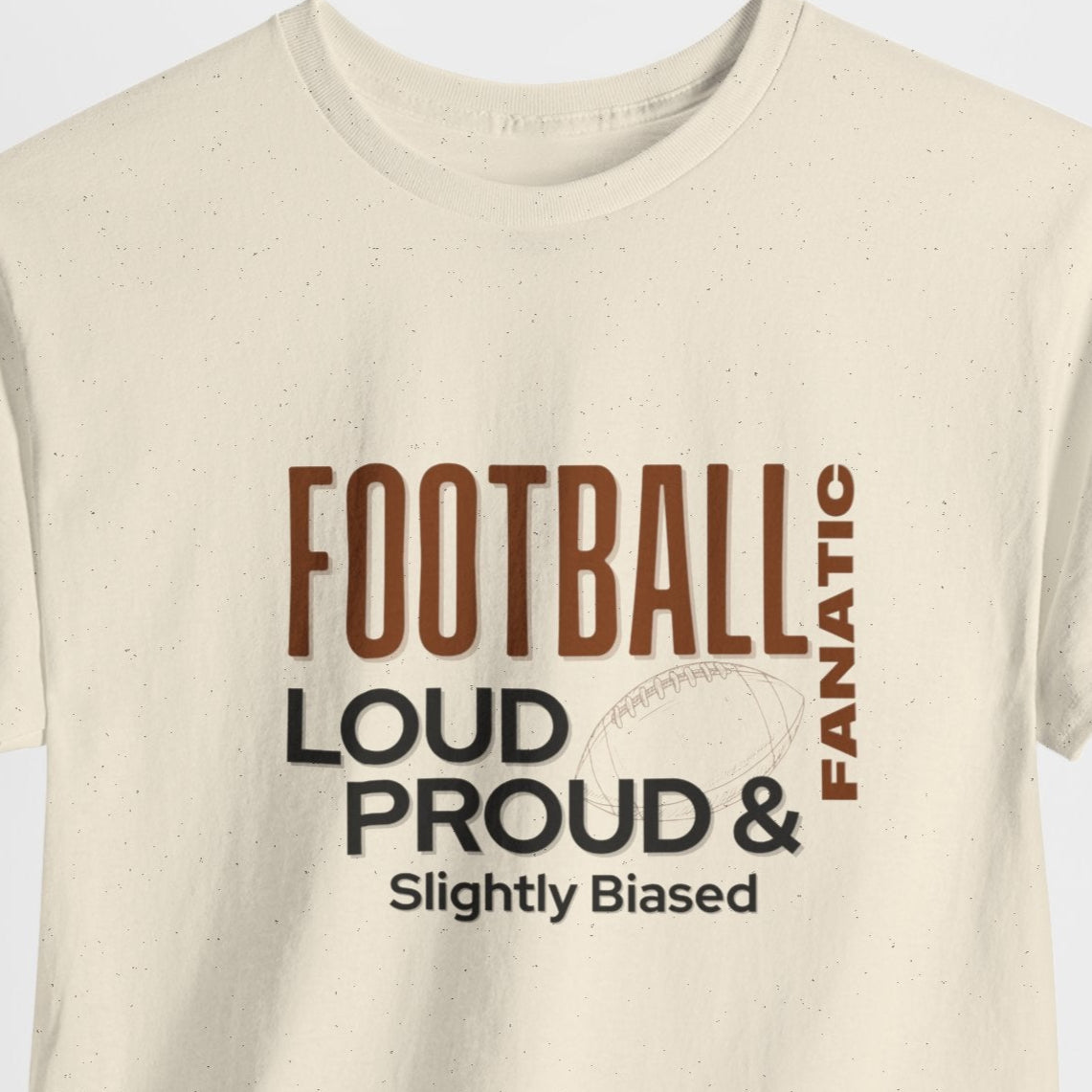 Beige t-shirt with text 'FOOTBALL FANATIC LOUD PROUD & Slightly Biased' on a white background